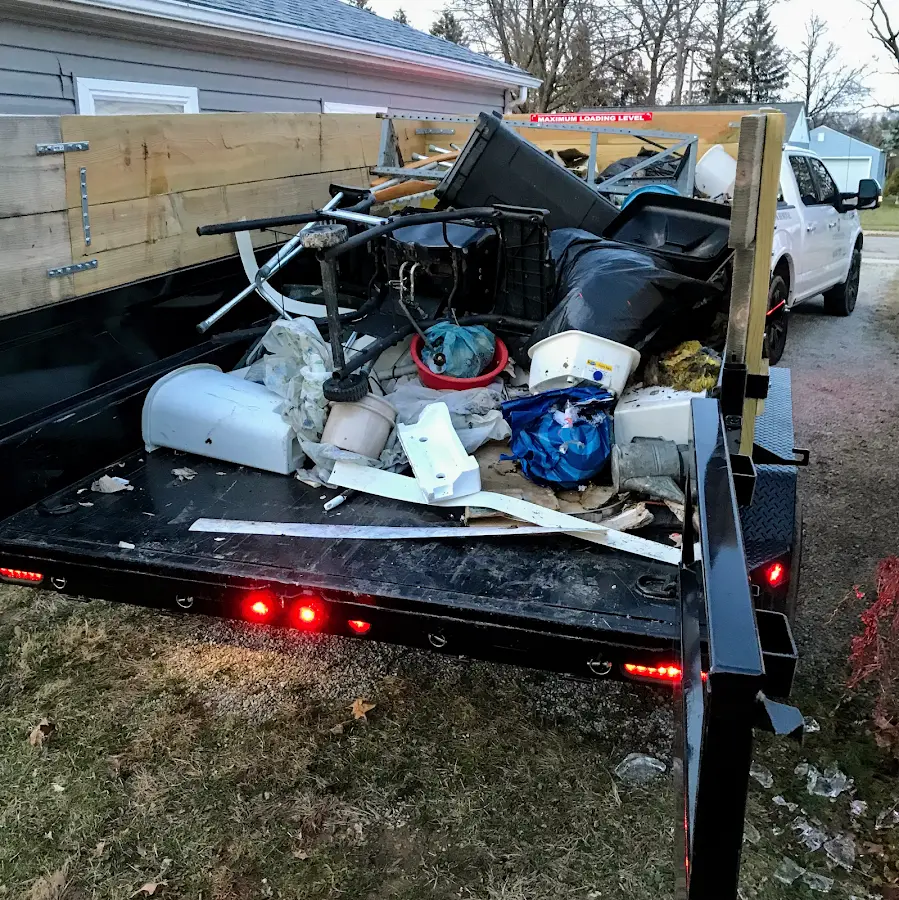 Roll-off dumpster delivered to a residential driveway in Lawrence