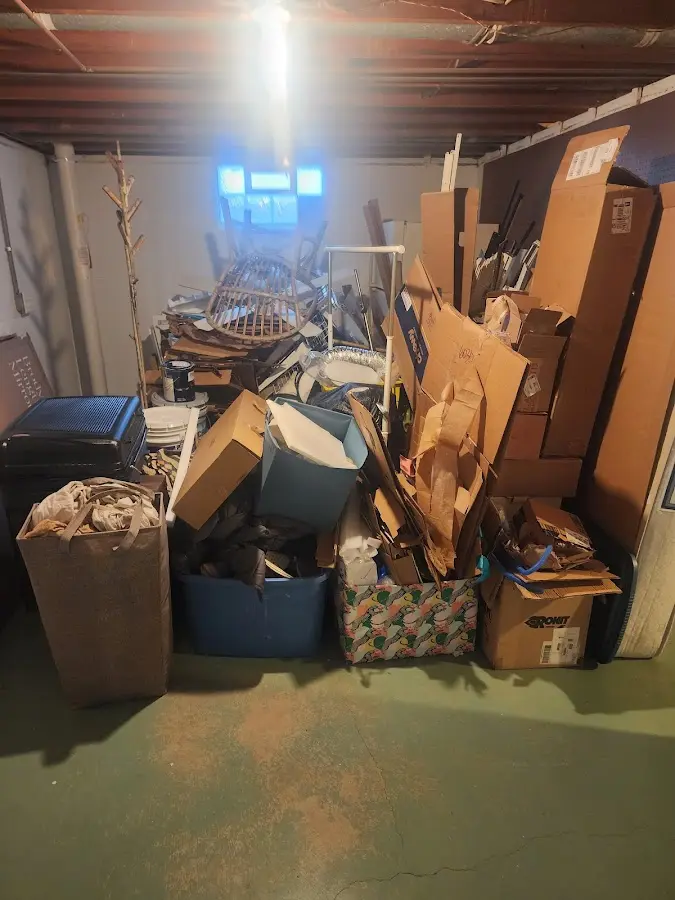 Roll-off dumpster container at job site for Yard Waste Dumpster Rental in Lawrence